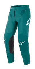 Alpinestars Supertech Blaze crossbroek, motorcross broek, donkergroen, voorzien van witte Alpinestars-logo's, zwarte lederen knieverstevigingspanelen, ratelsluiting in de taille en mesh-ventilatie op de heupen, duurzame constructie voor off-road racen